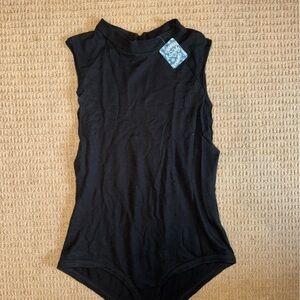 Free People loose fitting body suit!